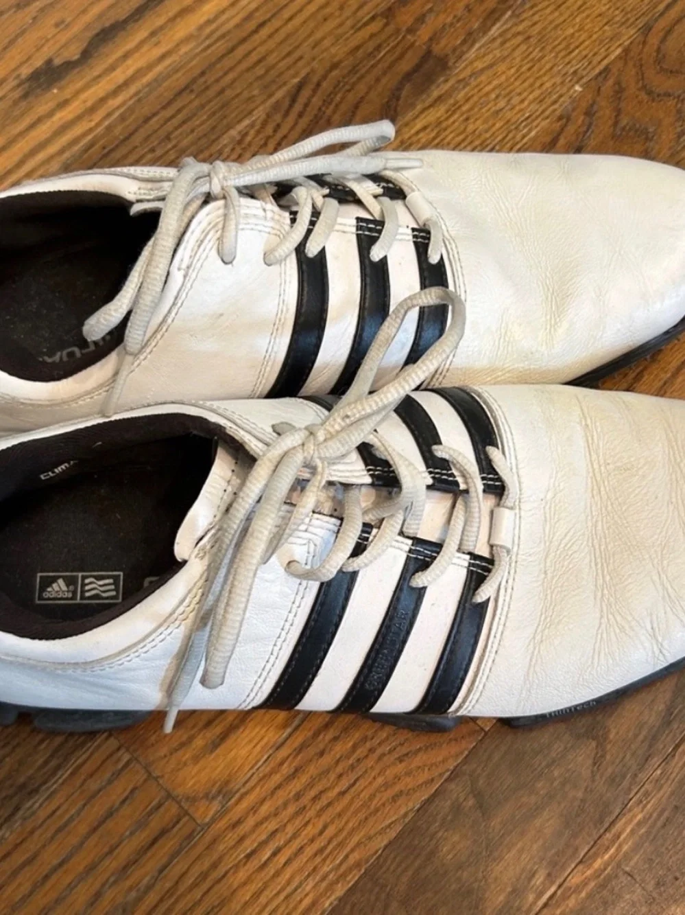 adidas White Athletic Shoes with Black Stripes